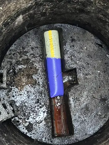 Freshly installed liner expanding and bonding to the inside of the old pipe.