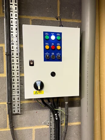 Routine pump control board inspection to ensure the system is running smoothly.