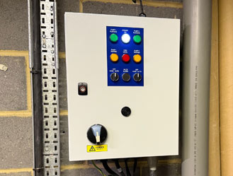 Pump control board checked during a routine system inspection.