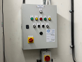 Pump station control panel fully inspected and serviced.